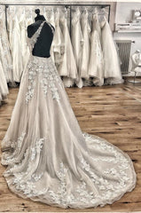 Elegant Backless Halter Wedding Dress with Lace Appliques and Tulle Ruffles