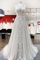Elegant Long A-line Wedding Dresses Featuring Ruffles, Tulle Lace, and Open Back