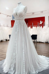 Elegant Long A-line Wedding Dresses Featuring Ruffles, Tulle Lace, and Open Back