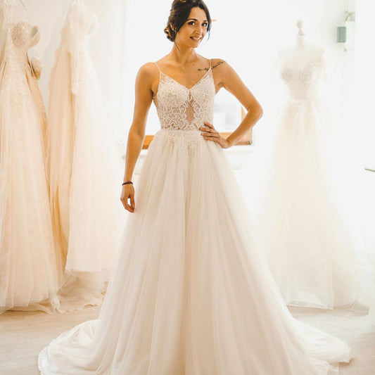 Elegant A-line Wedding Gown with Long Spaghetti Straps and Tulle