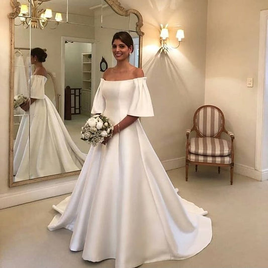 Elegant Off-the-Shoulder Short Sleeve A-Line Bridal Gown Featuring Satin Ruffles and a Train