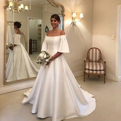 Elegant Off-the-Shoulder Short Sleeve A-Line Bridal Gown Featuring Satin Ruffles and a Train