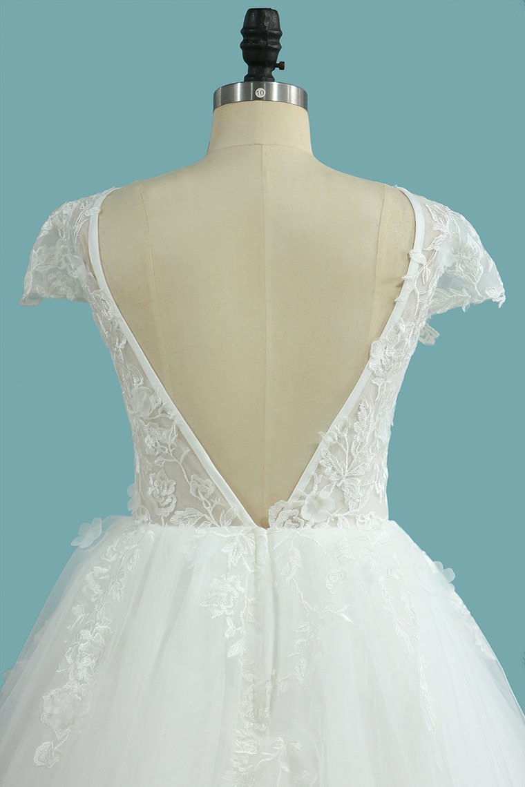 Elegant Floor-length Bateau Wedding Dress with Backless Lace and Tulle Appliques in an A-Line Silhouette