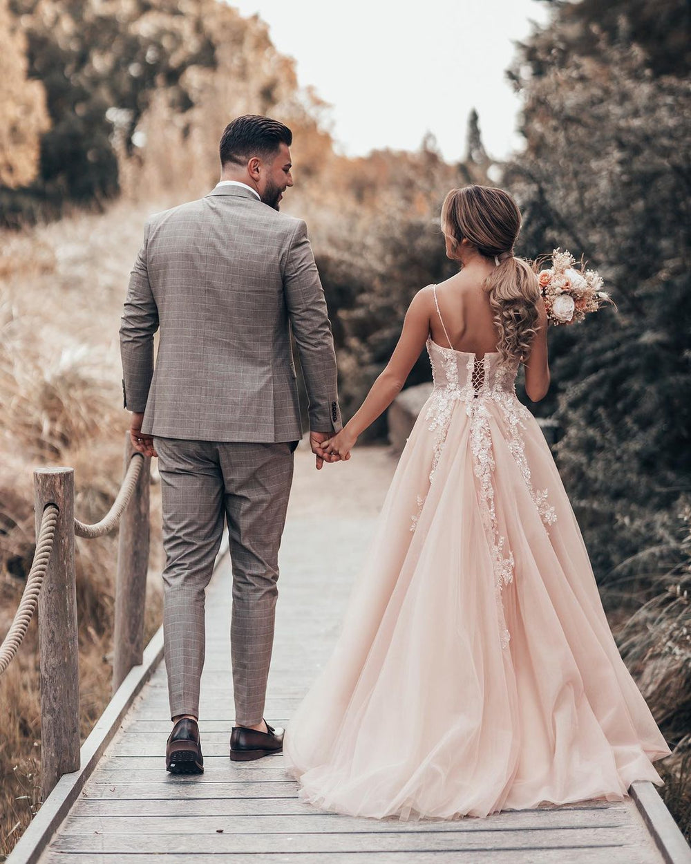 Elegant A-Line Wedding Gown with Chic Spaghetti Straps and Tulle Lace