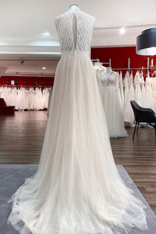 Elegant Backless A-line Wedding Gown with Tulle Lace and Halter Neckline