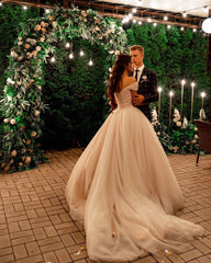 Elegant A-line Long Tulle Wedding Gown with Off-the-shoulder Neckline and Chapel Train