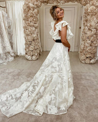 Elegant Off-the-Shoulder Backless Pearl Lace Wedding Gown Featuring A-Line Silhouette and Sash Appliques