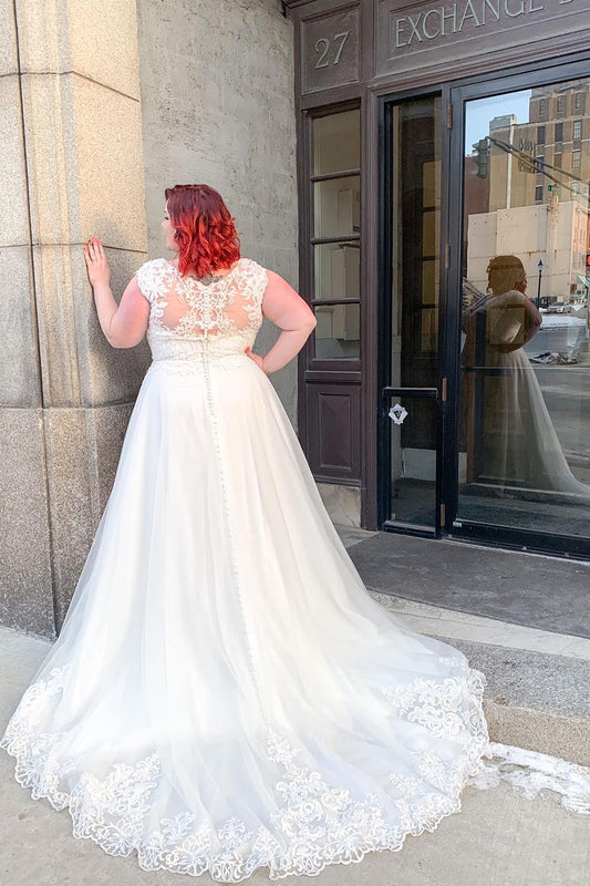 Elegant A-Line V-Neck Wedding Gown with Wide Straps and Lace Appliques