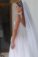 Sleeveless White A-Line Wedding Dress with Elegant Tulle, Spaghetti Straps, Sequins, and Lace