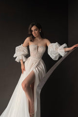 Elegant White Tulle Strapless Gown with Puff Sleeves, Long Split, and Beadings