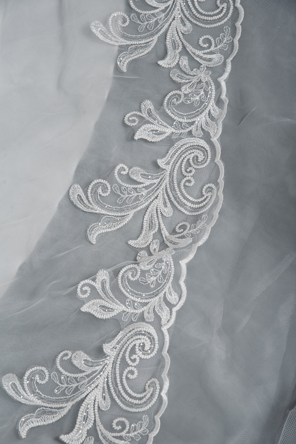 Elegant Long Sleeve Ruffled Ball Gown Wedding Dress Featuring Lace Appliques
