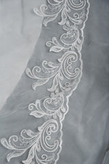 Elegant Long Sleeve Ruffled Ball Gown Wedding Dress Featuring Lace Appliques