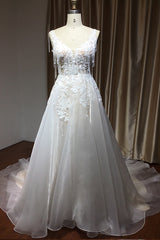 Elegant V-neck Backless Straps A-line Bridal Gown Featuring Appliques