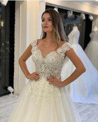 Pearl-Embellished V-Neck A-Line Wedding Gown with Wide Straps and Lace Appliques
