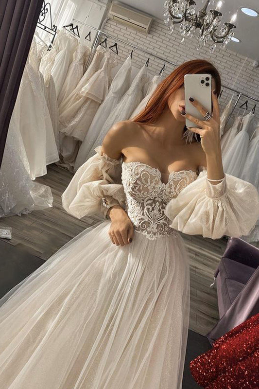 Elegant Off-the-Shoulder A-Line Gown with Long Sleeves and Tulle Appliques
