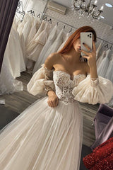 Elegant Off-the-Shoulder A-Line Gown with Long Sleeves and Tulle Appliques