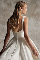 Elegant Ivory Satin A-Line Long Wedding Gown with Spaghetti Straps and Pleated Detail