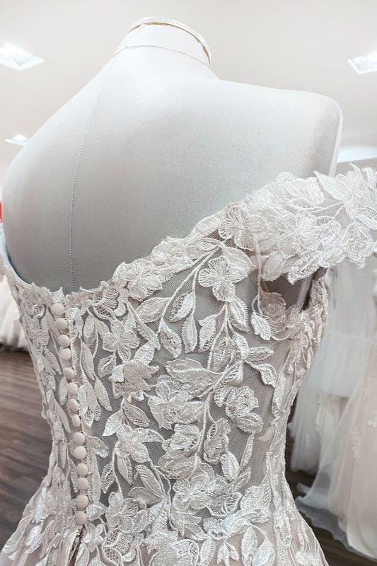 Elegant Off-the-shoulder A-line Wedding Dress Featuring Ruffles and Tulle Lace