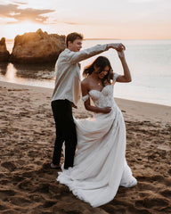 Elegant Off-the-shoulder A-Line Wedding Dress with Lace Appliques and Tulle Train