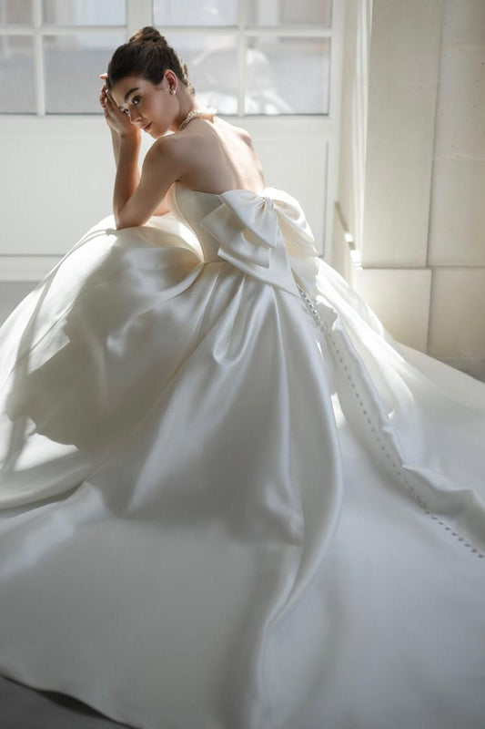 Elegant White Satin Long Pleated Strapless Wedding Gown with Bow