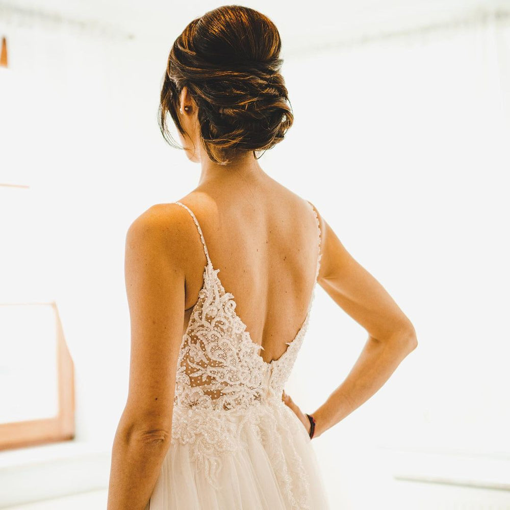 Elegant A-line Wedding Gown with Long Spaghetti Straps and Tulle
