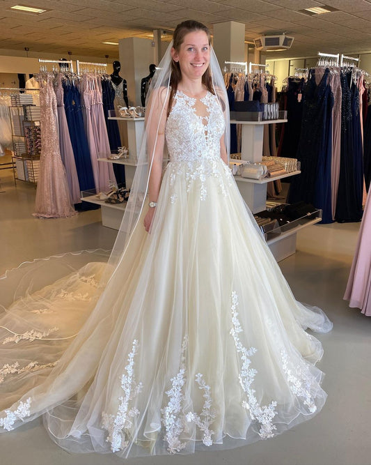 Backless A-Line Bateau Wedding Dress with Elegant Tulle Ruffles and Lace Appliques