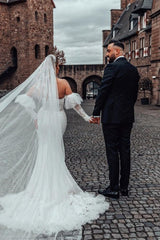 Sweetheart Mermaid Wedding Dress with Long Bubble Sleeves and Lace