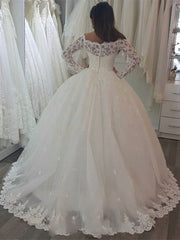 Elegant Off-the-Shoulder Wedding Gown with Long Sleeves and Lace Appliques