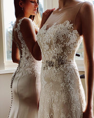 Elegant Pearl Mermaid Bateau Wedding Gown with Floor-length Lace and Sash Appliques