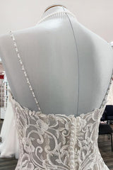 Elegant V-neck Spaghetti-Strap Tulle Ball Gown Bridal Dress Featuring Lace Ruffles