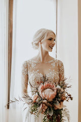 Elegant A-Line Wedding Gown in Chiffon with Long Sleeves and Lace Appliques