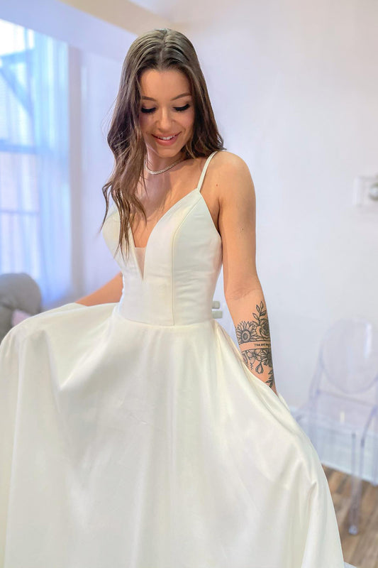 Sweetheart A-Line Wedding Dress with Elegant Spaghetti Straps and Satin Backless Design