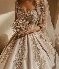 Elegant Sweetheart Pearl Wedding Dress with Long Sleeves in Satin and Beadings