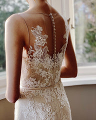 Elegant Pearl Mermaid Bateau Wedding Gown with Floor-length Lace and Sash Appliques