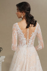 Elegant Long-Sleeve Illusion Wedding Gown in Sheer Tulle with Lace