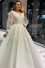 Elegant V-neck Lace Appliques Tulle A-Line Bridal Gown Featuring Puffy Long Sleeves