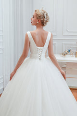 Elegant A-Line Wedding Gown with Deep V-Neck and Wide Tulle Straps