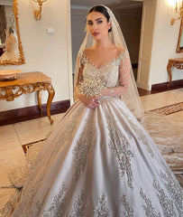 Elegant Sweetheart Pearl Wedding Dress with Long Sleeves in Satin and Beadings