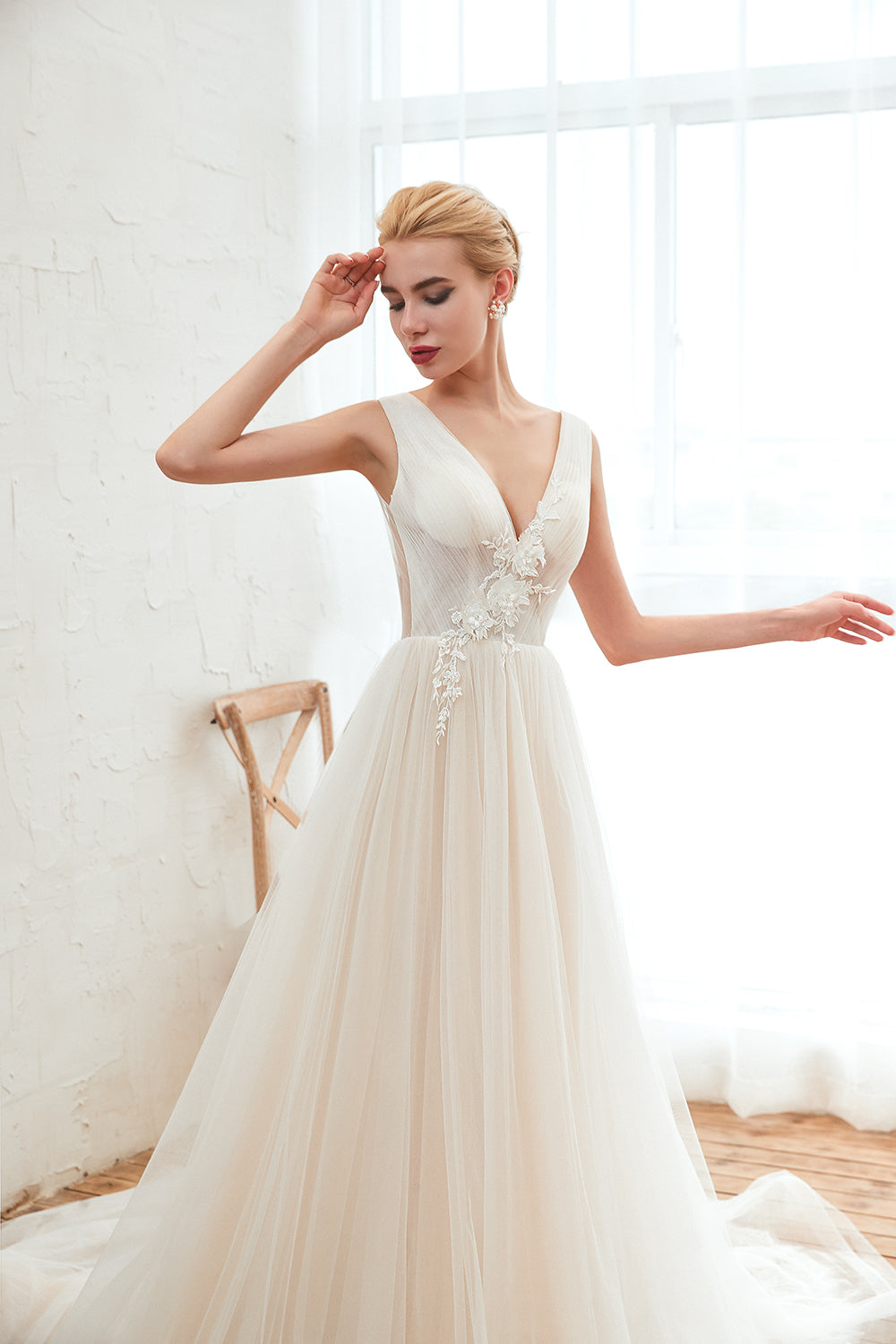 Elegant A-Line Wedding Dress with Deep V-neck and Floor-length Tulle
