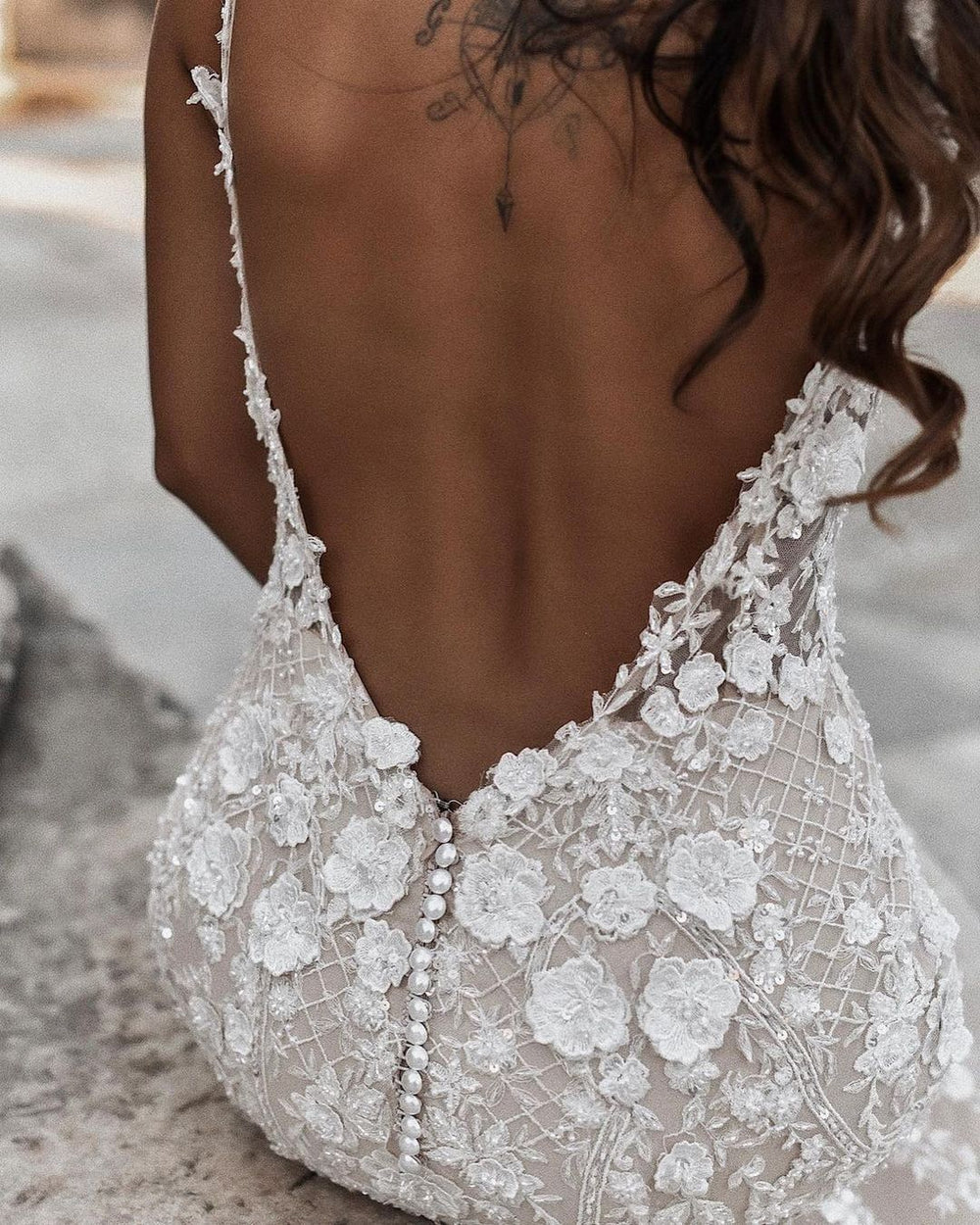 Elegant Lace Backless Mermaid Wedding Dress with Long V-neck and Floral Details