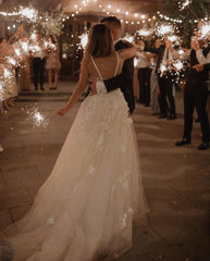 Elegant V-neck A-line Tulle Wedding Dress with Backless Design and Lace Appliques