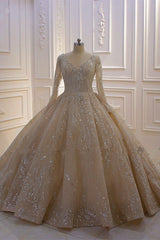 Elegant V-neck Ball Gown with Long Sleeves, Sequins, Beading, and Ruffles