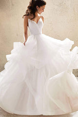V-neck A-line Wedding Dress with Elegant Ruffles, Spaghetti Straps, and Tulle Backless Design