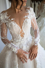 Elegant Sweetheart A-line Wedding Gown with Open Back and Long Lace Sleeves