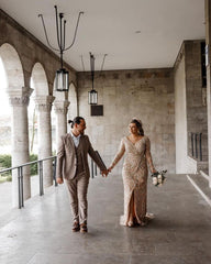 Elegant V-neck Mermaid Wedding Gown with Long Sleeves and Slit