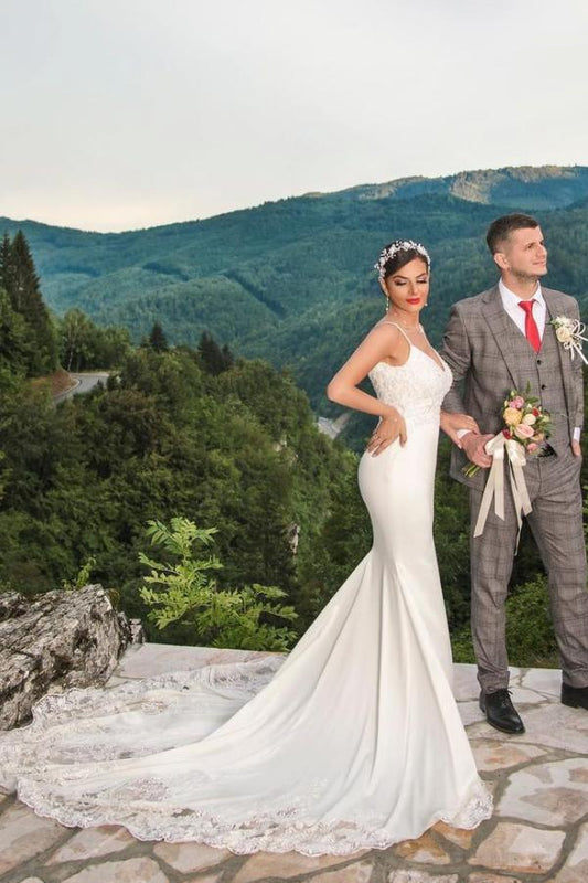 Elegant Mermaid Wedding Gown with Spaghetti Straps, V-neck, and Lace Details