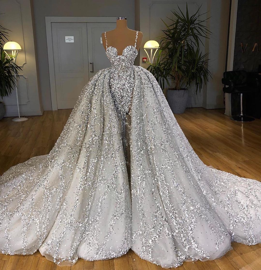 Sweetheart Mermaid Wedding Dress with Elegant Sequins and Ruffled Train