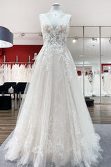 Sleeveless A-line Wedding Dress in Tulle with Elegant Deep V-neck and Open Back Lace Appliques