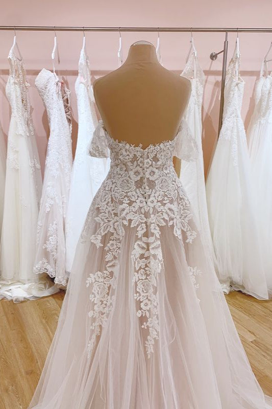 Elegant A-Line Off-the-Shoulder Wedding Gown Featuring a Backless Sweetheart Tulle Train