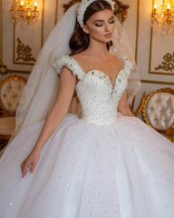 Elegant Off-the-Shoulder Princess Wedding Dress with Beaded Pearl Tulle